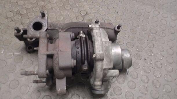 Foto: AUSPUFFKRÜMMER / TURBOLADER eines VW Polo 1.4 TDI L