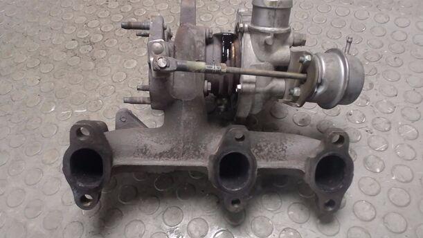 Foto: AUSPUFFKRÜMMER / TURBOLADER eines VW Polo 1.4 TDI L