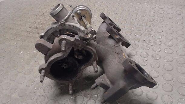 Foto: AUSPUFFKRÜMMER / TURBOLADER eines VW Polo 1.4 TDI L