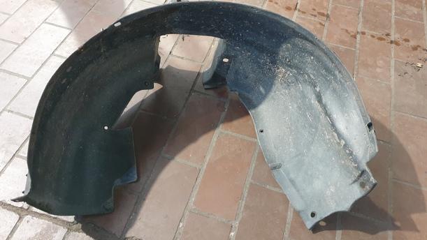 Foto: RADHAUSSCHALE/ INNENRADHAUS VORN LINKS eines Opel Corsa