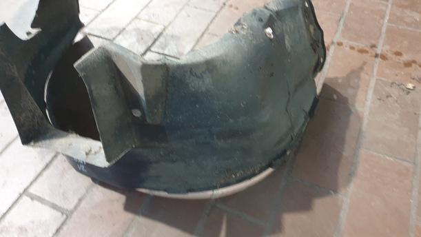 Foto: RADHAUSSCHALE/ INNENRADHAUS VORN LINKS eines Opel Corsa