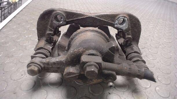 Foto: BREMSSATTELVORN LINKS eines Opel Corsa 1.2 16V Attraction