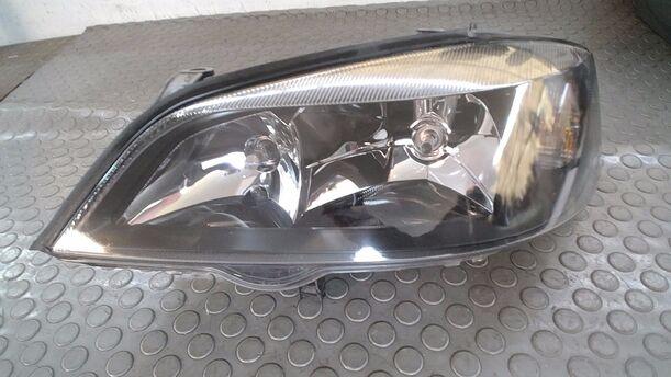 Foto: SCHEINWERFER LINKS ( SCHWARZE AUSFÜHRUNG ) eines Opel Astra 1.7 DTI Style