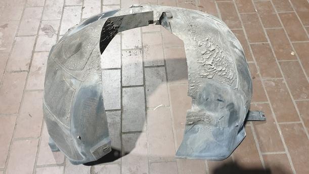 Foto: RADHAUSSCHALE / INNENKOTFLÜGEL VORNE LINKS eines Opel Astra 2.0 CDTI DPF ecoFLEX SportsTourer Start/Stop