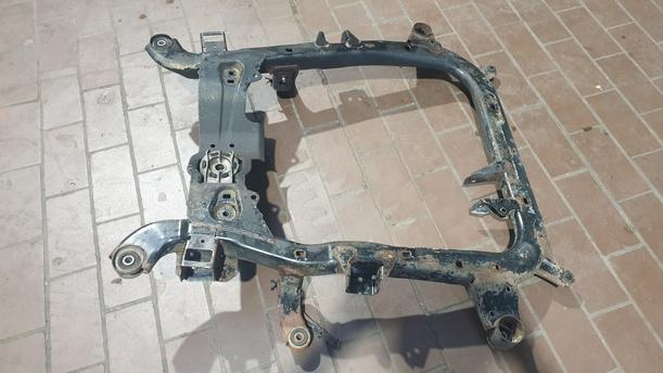 Foto: VORDERACHSE / ACHSTRÄGER VORN eines Opel Astra 2.0 Caravan LX