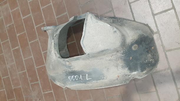 Foto: INNENKOTFLÜGEL / RADHAUSSCHALE VORNE LINKS eines VW Polo 1.2