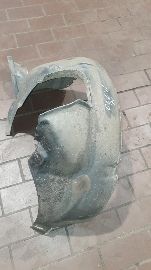 Foto: RADHAUSSCHALE / INNENKOTFLÜGEL VORNE RECHTS eines VW Polo 1.2