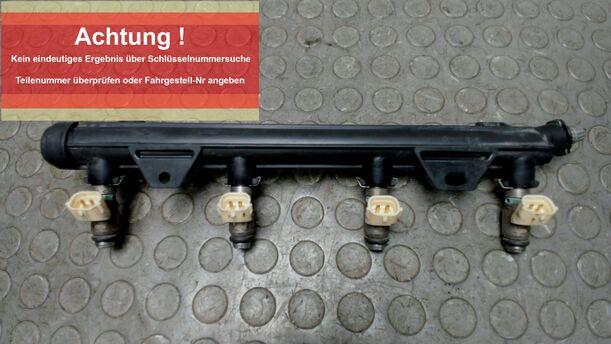 Foto: KRAFTSTOFFVERTEILER / EINSPRITZDÜSEN eines VW Golf Plus 1.4