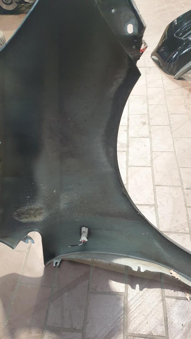 Foto: KOTFLÜGEL LINKS eines Opel Corsa 1.4 16V