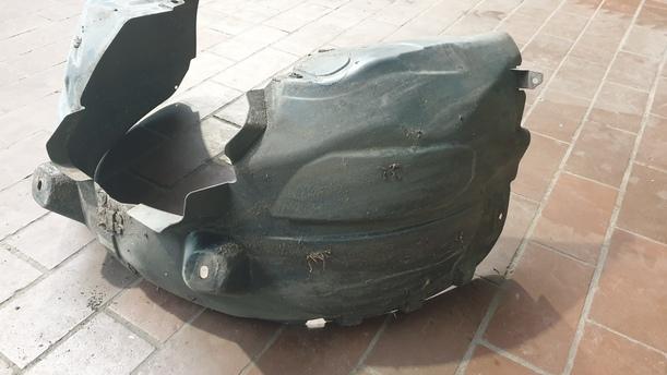 Foto: RADHAUSSCHALE / INNENKOTFLÜGEL LINKS eines Opel Corsa 1.4 16V