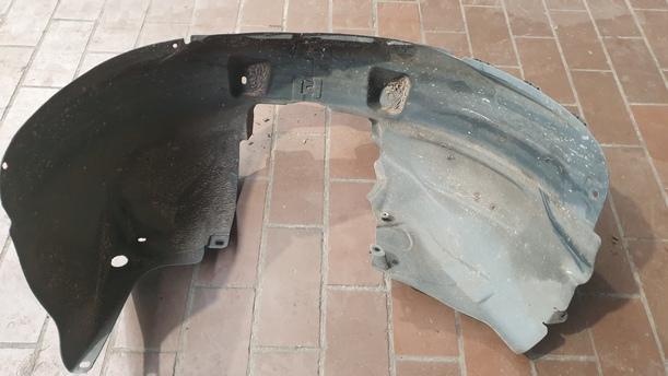 Foto: RADHAUSSCHALE / INNENKOTFLÜGEL LINKS eines Opel Corsa 1.4 16V