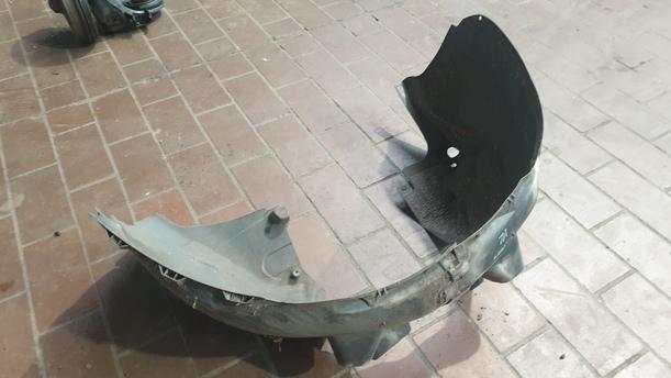 Foto: RADHAUSSCHALE / INNENKOTFLÜGEL LINKS eines Opel Corsa 1.4 16V