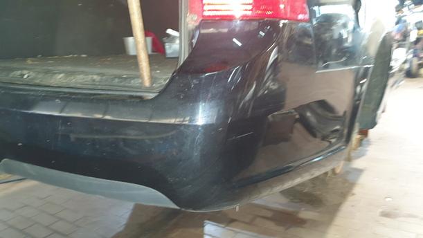 Foto: STOSSFÄNGER/ STOßSTANGE HINTEN ( KOMBI ) eines Saab 9-5 Kombi 1.9 TiD Sport