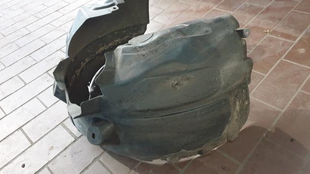 Foto: RADHAUSSCHALE / INNENKOTFLÜGEL LINKS eines Opel Corsa 1.2 16V Sport