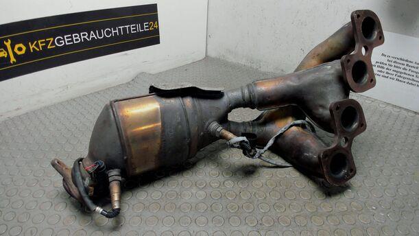 Foto: AUSPUFFKRÜMMER MIT KATALYSATOR eines Mercedes-Benz C 180 T Kompressor Sport