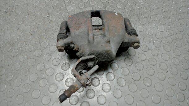 Foto: BREMSSATTEL VORNE LINKS eines VW Passat Variant 1.8 Stylance