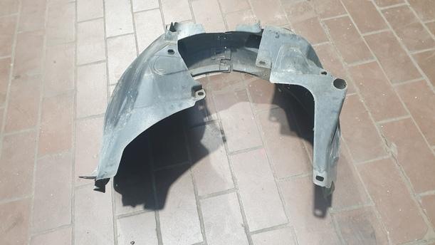 Foto: RADHAUSSCHALE / INNENKOTFLÜGEL LINKS eines Opel Corsa 1.2 16V Stylance