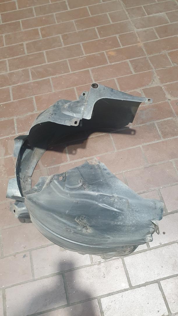 Foto: RADHAUSSCHALE / INNENKOTFLÜGEL LINKS eines Opel Corsa 1.2 16V Stylance