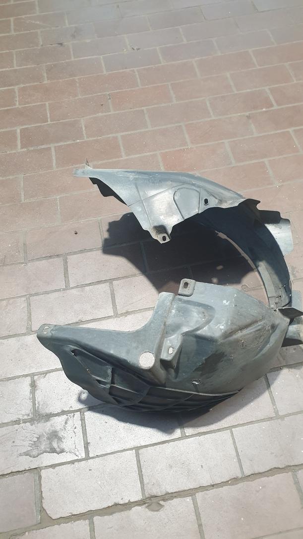Foto: RADHAUSSCHALE / INNENKOTFLÜGEL LINKS eines Opel Corsa 1.2 16V Stylance