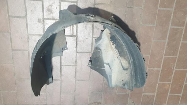 Foto: RADHAUSSCHALE / INNENKOTFLÜGEL LINKS eines Opel Corsa 1.2 16V Stylance
