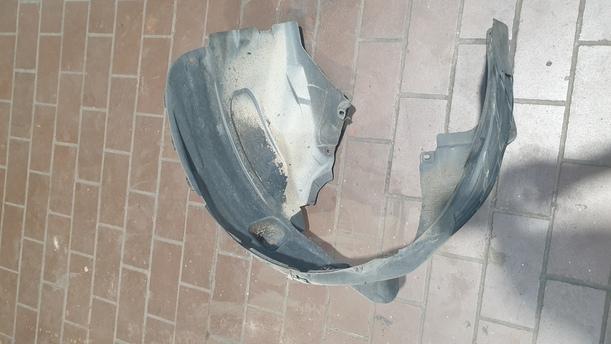 Foto: RADHAUSSCHALE / INNENKOTFLÜGEL LINKS eines Opel Corsa 1.2 16V Stylance