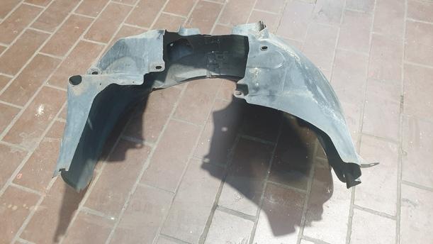 Foto: RADHAUSSCHALE / INNENKOTFLÜGEL RECHTS eines Opel Corsa 1.2 16V Stylance