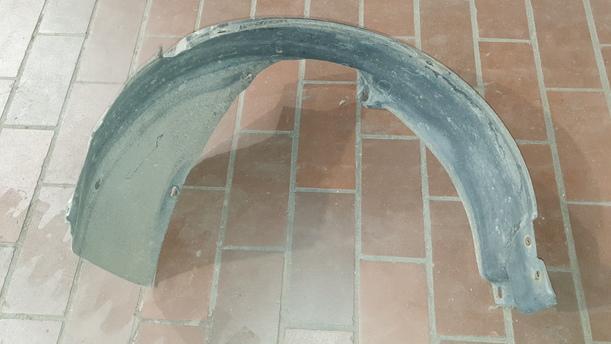 Foto: INNENKOTFLÜGEL / RADHAUSSCHALE LINKS eines VW Polo 45