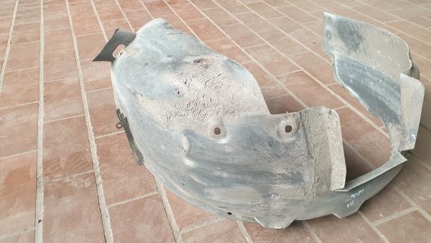 Foto: INNENKOTFLÜGEL / RADHAUSSCHALE LINKS eines Opel Corsa 1.2 16V