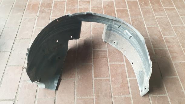 Foto: INNENKOTFLÜGEL / RADHAUSSCHALE LINKS eines Opel Corsa 1.2 16V