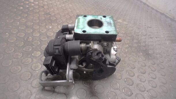 Foto: DROSSELKLAPPE / DROSSELKLAPPENSTUTZEN eines VW Polo 45 Liftback