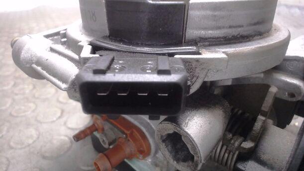 Foto: DROSSELKLAPPE / DROSSELKLAPPENSTUTZEN eines VW Polo 45 Liftback