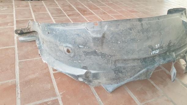 Foto: RADHAUSSCHALE / INNENKOTFLÜGEL VORNE LINKS eines Nissan Micra 1.0