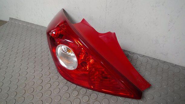 Foto: HECKLEUCHTE/ RÜCKLEUCHTE LINKS ( 2/3 TÜRER ) eines Opel Corsa 1.2 16V