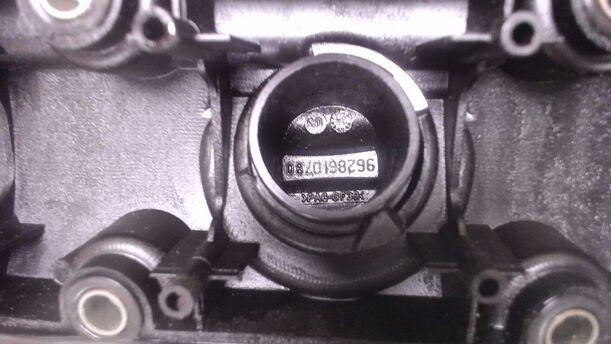 Foto: VENTILDECKEL EINLASS / VORNE eines Peugeot 307 SW 135