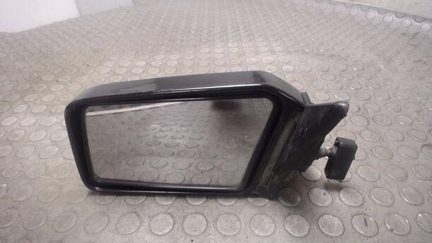 Foto: AUSSENSPIEGEL MECH. VERSTELLBAR LINKS eines Toyota Corolla 1.3 XL Liftback