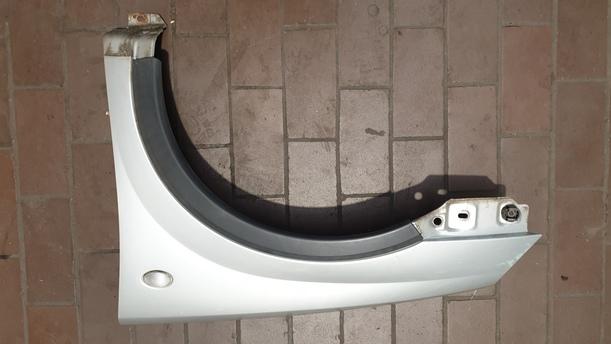 Foto: KOTFLÜGEL VORNE LINKS eines Opel Corsa 1.2 16V GL