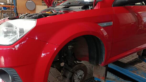 Foto: KOTFLÜGEL LINKS eines Opel Tigra Twin Top 1.3 CDTI