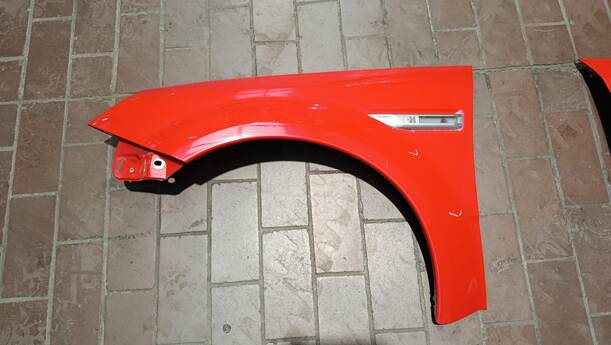 Foto: KOTFLÜGEL LINKS eines Opel Tigra Twin Top 1.3 CDTI