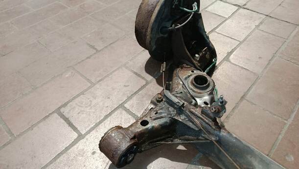 Foto: HINTERACHSE eines Opel Tigra Twin Top 1.3 CDTI