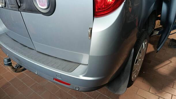 Foto: STOSSFÄNGER / STOßSTANGE HINTEN eines Fiat Doblo Cargo DPF Ghia