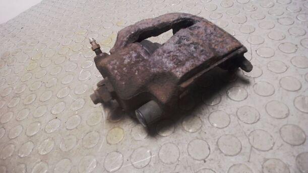 Foto: BREMSSATTEL VORN LINKS eines Opel Astra 1.6 Caravan
