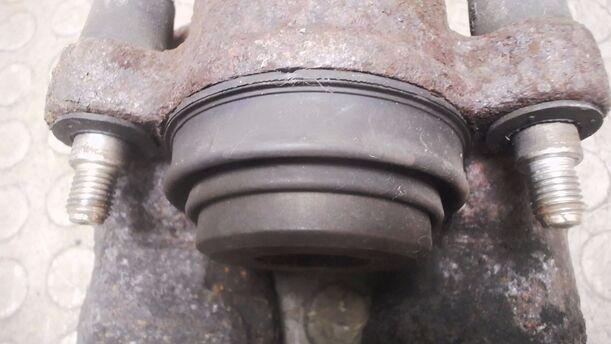Foto: BREMSSATTEL VORN LINKS eines Opel Astra 1.6 Caravan