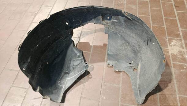 Foto: RADHAUSSCHALE/ INNENRADHAUS VORN RECHTS eines Opel Corsa 1.2 16V