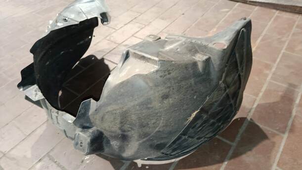 Foto: RADHAUSSCHALE/ INNENRADHAUS VORN RECHTS eines Opel Corsa 1.2 16V