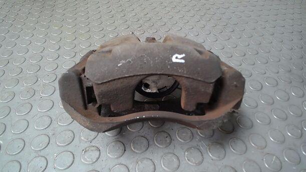 Foto: BREMSSATTEL VORN RECHTS ( BOSCH ) eines Opel Corsa 1.2 16V Cup