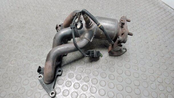 Foto: AUSPUFFKRÜMMER MIT KATALYSATOR eines VW Golf 1.4 Cup