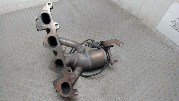 Foto: AUSPUFFKRÜMMER MIT KATALYSATOR eines VW Golf 1.4 Cup