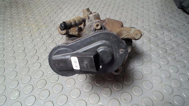 Foto: BREMSSATTEL HINTEN LINKS  ELEKTRISCH ( TRW ) eines VW Passat 2.0 TDI DPF