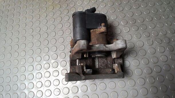 Foto: BREMSSATTEL HINTEN LINKS  ELEKTRISCH ( TRW ) eines VW Passat 2.0 TDI DPF