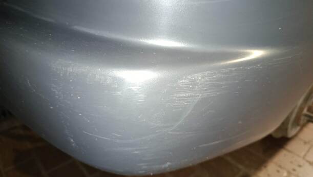 Foto: STOSSFÄNGER/ STOßSTANGE HINTEN ( UNLACKIERT ) eines Mazda Demio 1.4